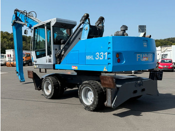 Колёсный экскаватор FUCHS