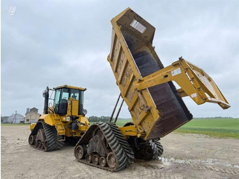 Сочленённый самосвал CATERPILLAR