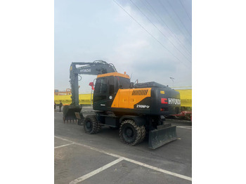 Колёсный экскаватор HYUNDAI R210