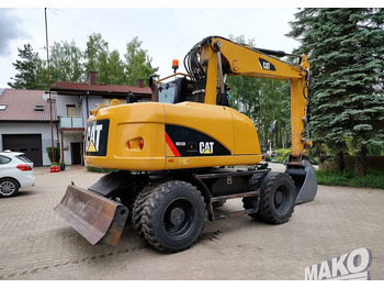 Колёсный экскаватор Caterpillar M313D: фото 4 Колёсный экскаватор Caterpillar M313D: фото 4