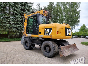 Колёсный экскаватор Caterpillar M313D: фото 2 Колёсный экскаватор Caterpillar M313D: фото 2