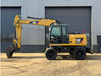 Колёсный экскаватор CATERPILLAR M313D