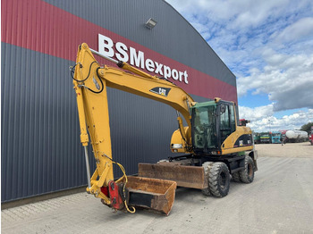 Колёсный экскаватор CATERPILLAR M315C