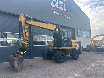 Колёсный экскаватор CATERPILLAR M313D