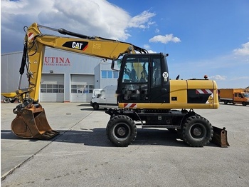 Колёсный экскаватор CATERPILLAR M315D