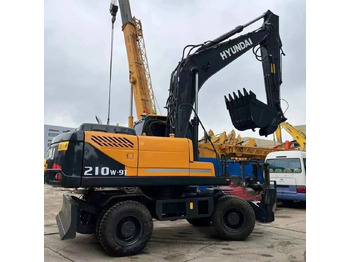 Колёсный экскаватор HYUNDAI R210