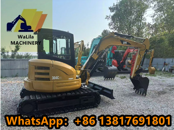 Мини-экскаватор CATERPILLAR