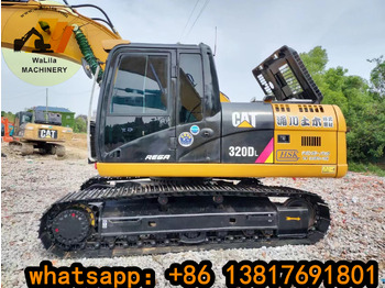 Гусеничный экскаватор CATERPILLAR