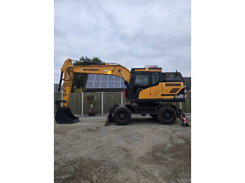 Колёсный экскаватор HYUNDAI