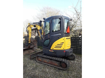 Мини-экскаватор NEW HOLLAND