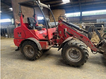 Компактный фронтальный погрузчик