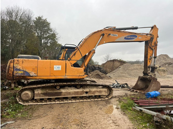 Гусеничный экскаватор