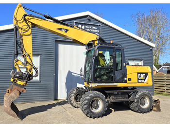 Колёсный экскаватор CATERPILLAR M313D