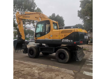 Колёсный экскаватор HYUNDAI R210