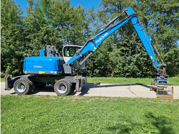 Колёсный экскаватор FUCHS