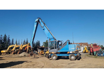 Колёсный экскаватор TEREX