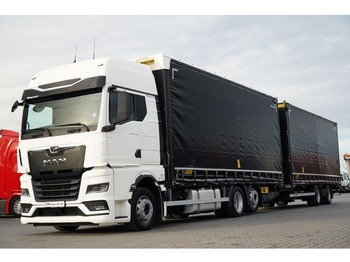 Тентованный грузовик MAN