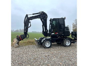 Колёсный экскаватор TAKEUCHI