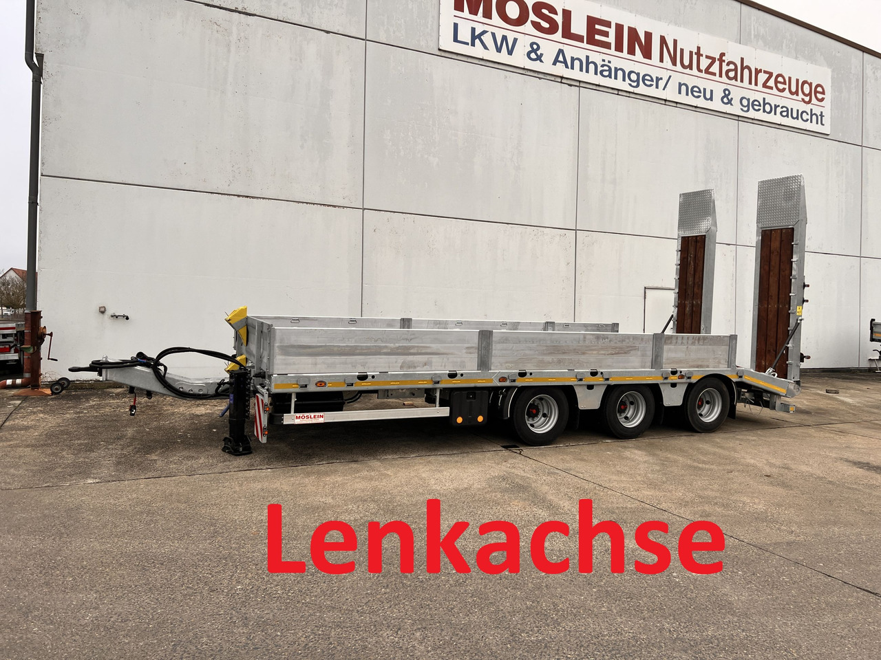 Möslein TT 31 31 t GG Tridem- Tieflader 3 Achs, gelenktNeufahrzeug - Низкорамный прицеп: фото 1 Möslein TT 31 31 t GG Tridem- Tieflader 3 Achs, gelenktNeufahrzeug - Низкорамный прицеп: фото 1