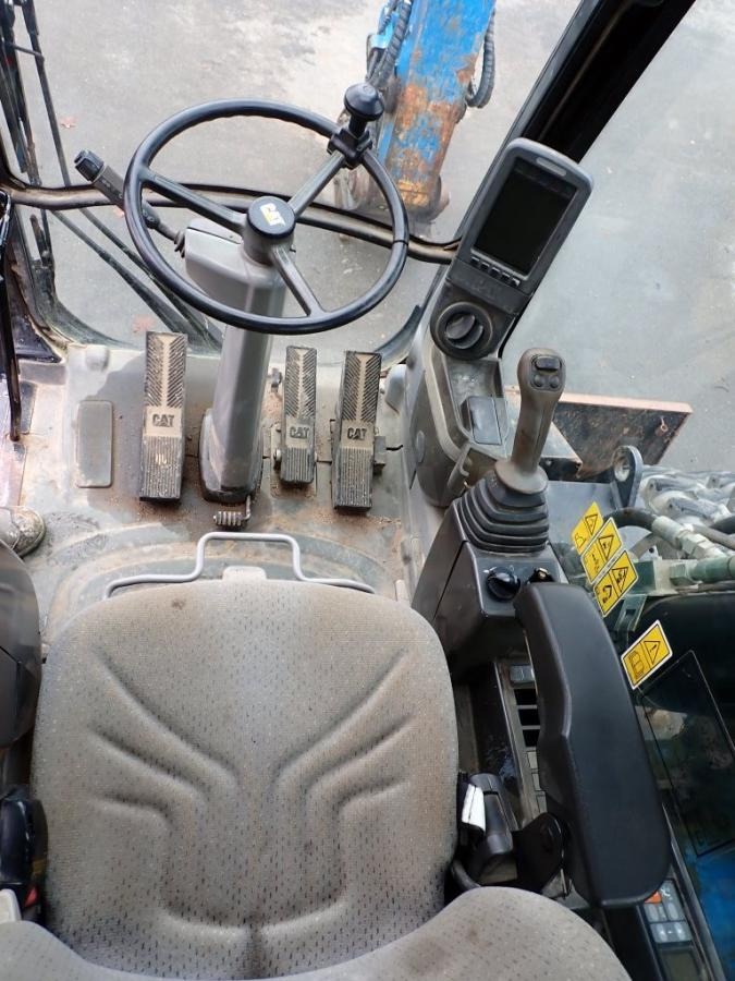 Caterpillar M322D - Колёсный экскаватор: фото 5 Caterpillar M322D - Колёсный экскаватор: фото 5