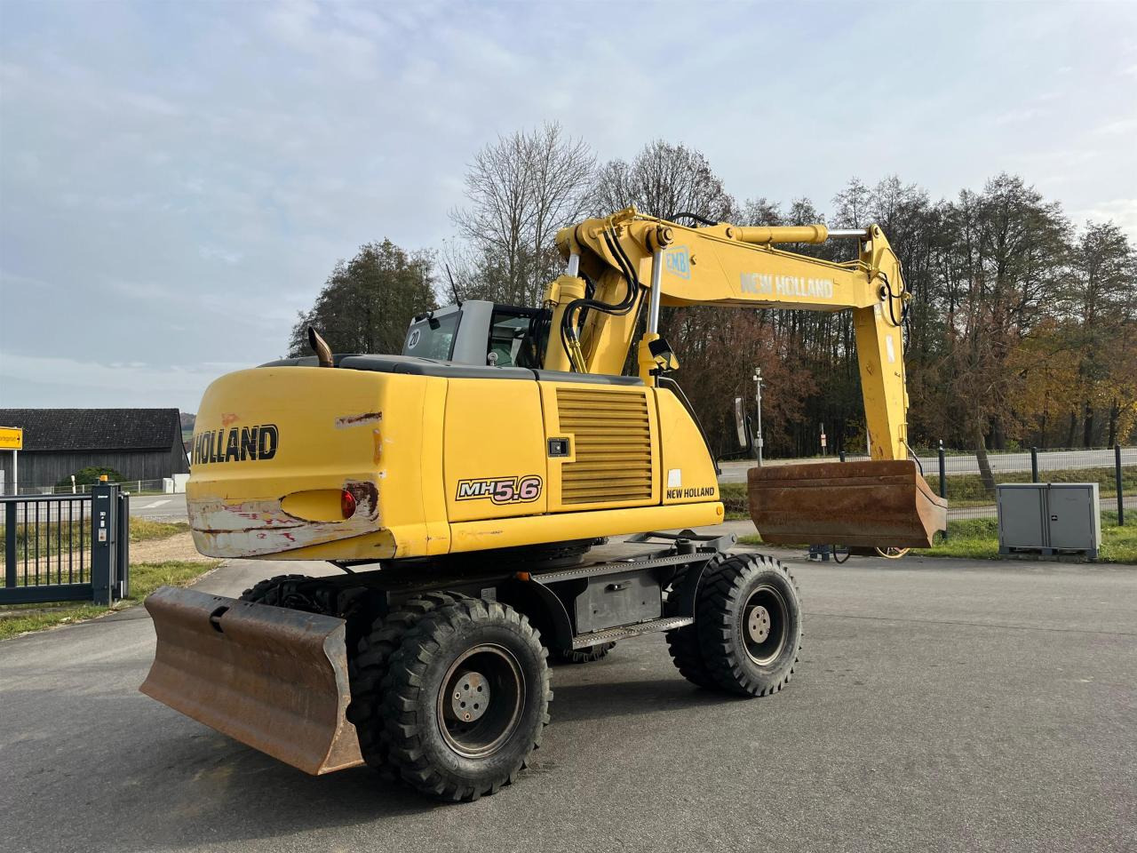 New Holland MH 5.6 inkl. Grabenlöffel, Tieflöffel - Колёсный экскаватор: фото 5 New Holland MH 5.6 inkl. Grabenlöffel, Tieflöffel - Колёсный экскаватор: фото 5