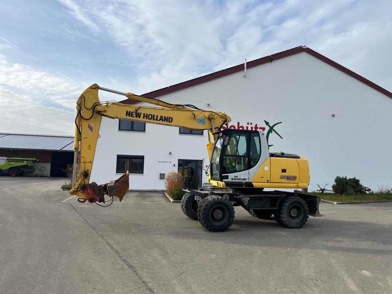 New Holland MH 5.6 inkl. Grabenlöffel, Tieflöffel - Колёсный экскаватор: фото 3 New Holland MH 5.6 inkl. Grabenlöffel, Tieflöffel - Колёсный экскаватор: фото 3