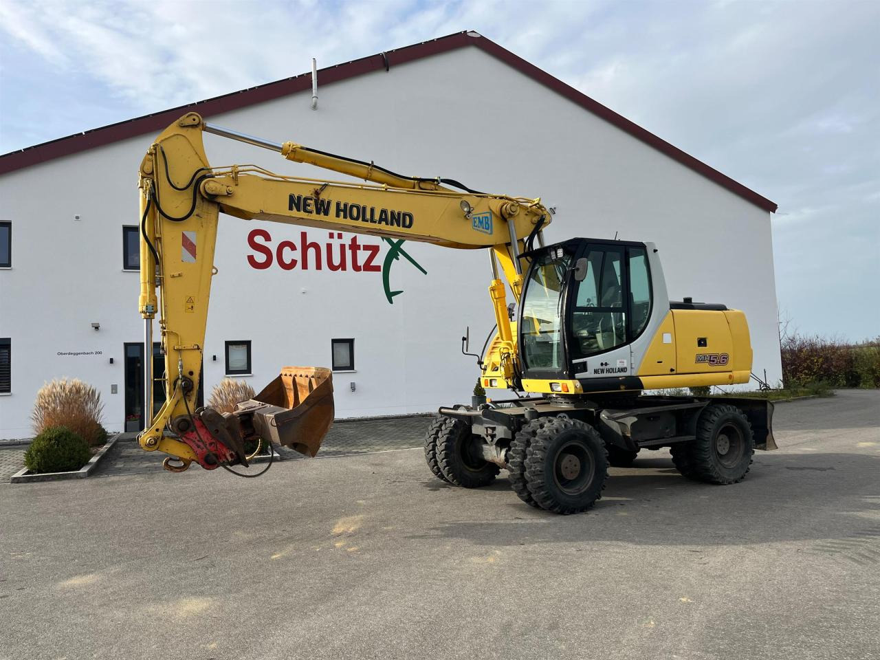 New Holland MH 5.6 inkl. Grabenlöffel, Tieflöffel - Колёсный экскаватор: фото 2 New Holland MH 5.6 inkl. Grabenlöffel, Tieflöffel - Колёсный экскаватор: фото 2