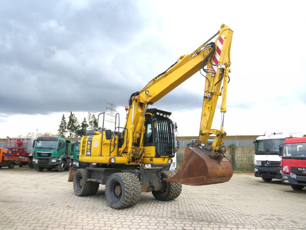 KOMATSU HANOMAG Mobilbagger PW 148 - 8 Bagger 6.824h Deutsch top - Колёсный экскаватор: фото 5 KOMATSU HANOMAG Mobilbagger PW 148 - 8 Bagger 6.824h Deutsch top - Колёсный экскаватор: фото 5
