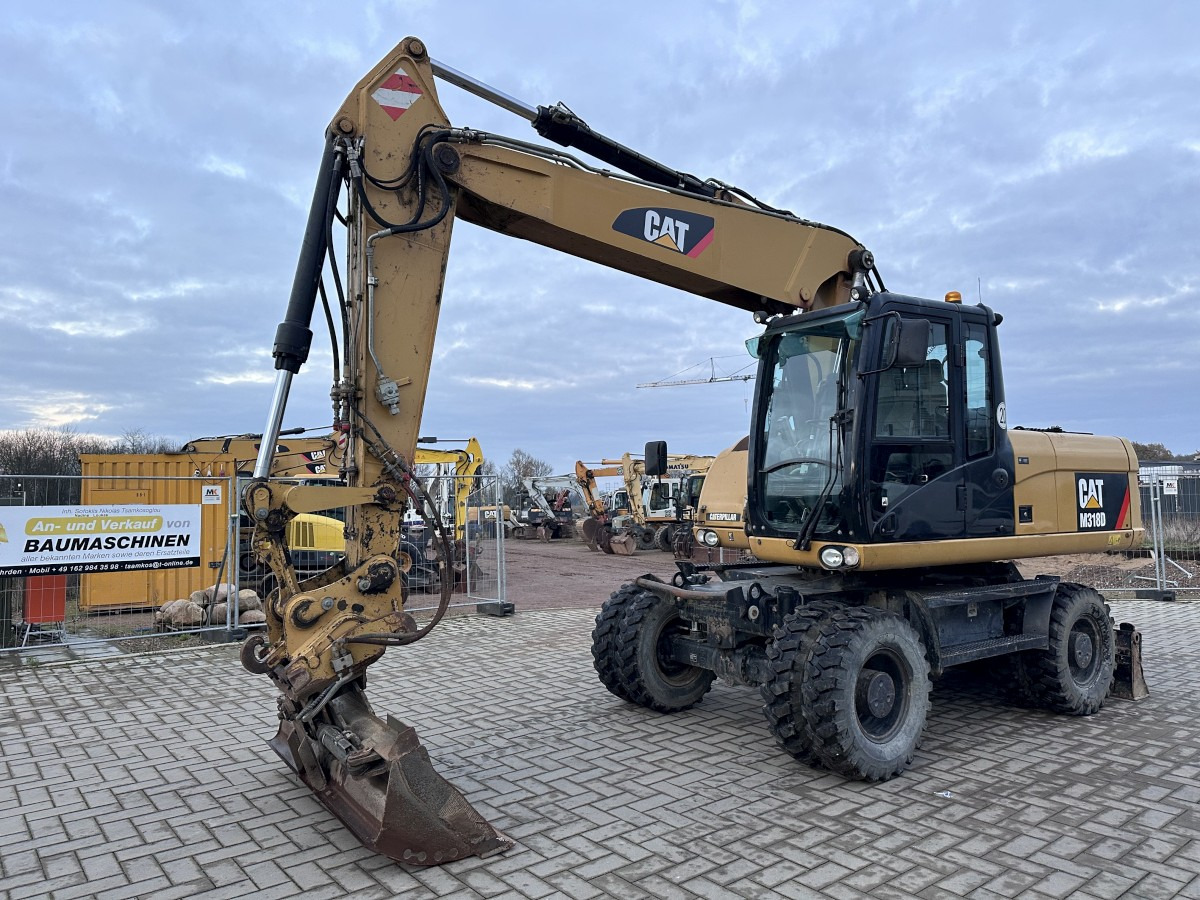 CATERPILLAR M 318 D full Hydr. Top Zustand German machine ! - Колёсный экскаватор: фото 4 CATERPILLAR M 318 D full Hydr. Top Zustand German machine ! - Колёсный экскаватор: фото 4