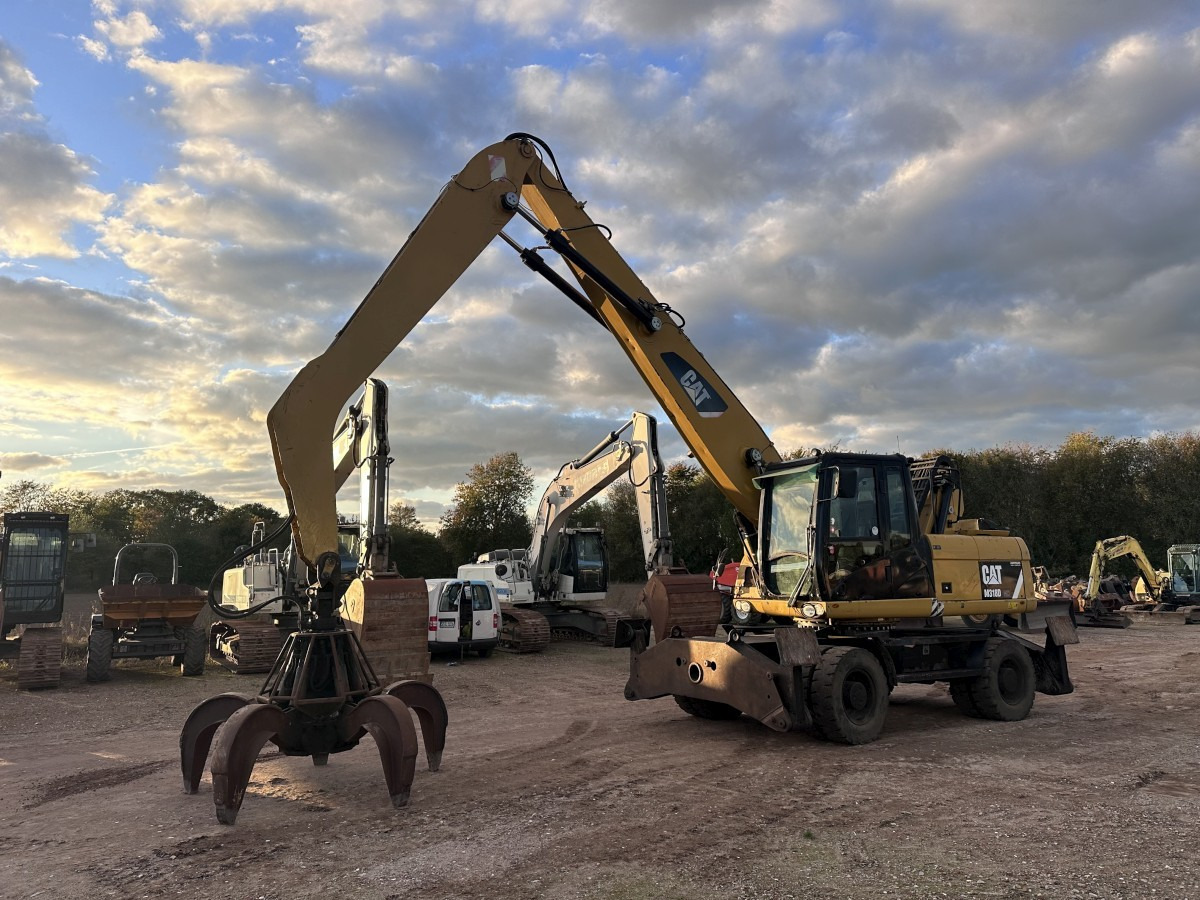 CATERPILLAR M 318 MH mit Greifer Kein 3022 3026 320 322 - Перегружатель: фото 1 CATERPILLAR M 318 MH mit Greifer Kein 3022 3026 320 322 - Перегружатель: фото 1