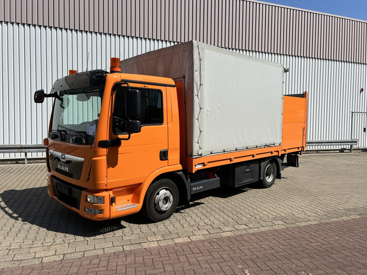 MAN TGL 7.180 4X2 BL TGL 7.180 4X2 BL mit LBW BÄR - Грузовик бортовой/ Платформа: фото 1 MAN TGL 7.180 4X2 BL TGL 7.180 4X2 BL mit LBW BÄR - Грузовик бортовой/ Платформа: фото 1