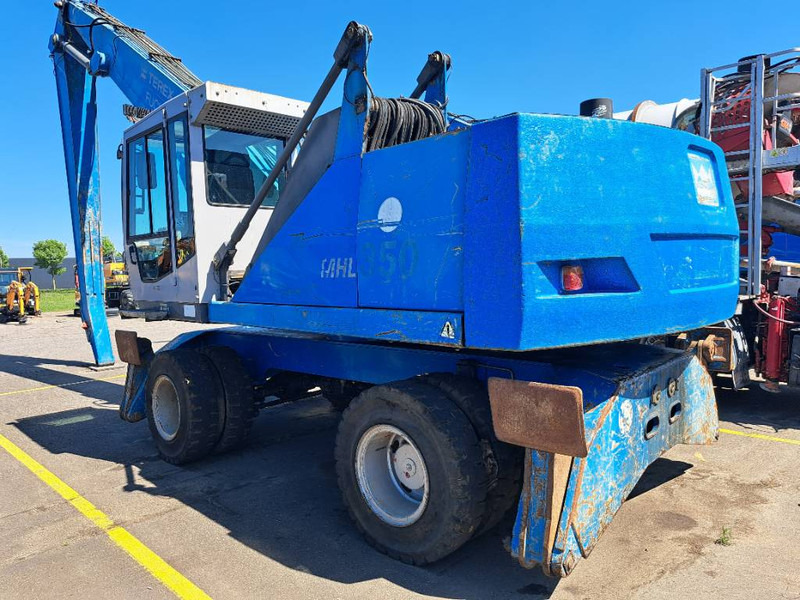 Fuchs MHL 350 - Перегружатель: фото 1 Fuchs MHL 350 - Перегружатель: фото 1