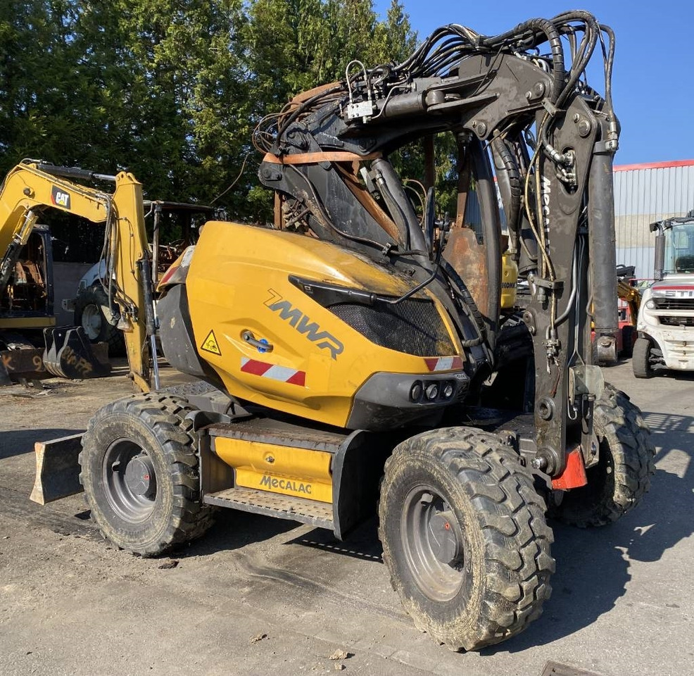 Mecalac 7 MWR Origine Française endommagée - Колёсный экскаватор: фото 3 Mecalac 7 MWR Origine Française endommagée - Колёсный экскаватор: фото 3