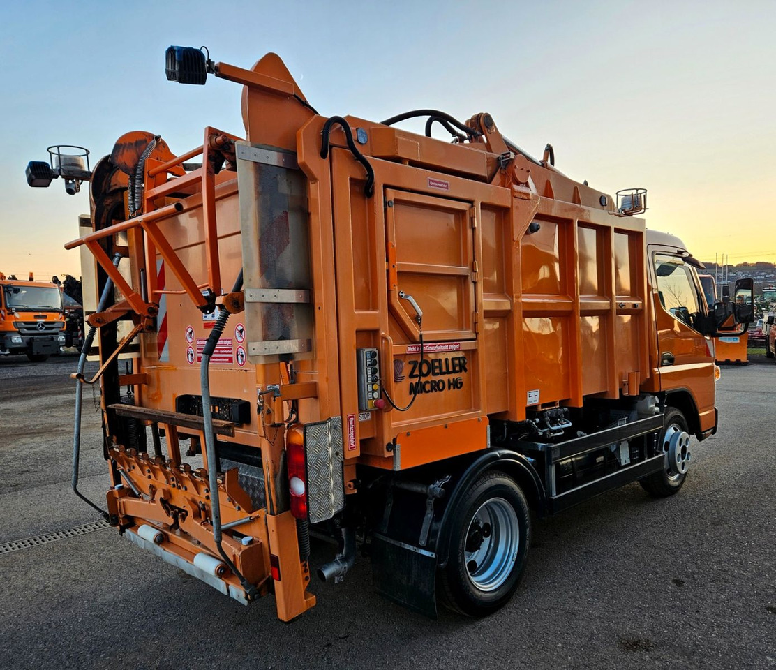 Mitsubishi Fuso Canter 6S15 Zoeller Micro Müllpresse - Мусоровоз: фото 4 Mitsubishi Fuso Canter 6S15 Zoeller Micro Müllpresse - Мусоровоз: фото 4