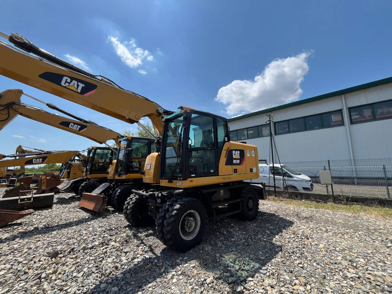 CAT M318F - Колёсный экскаватор: фото 1 CAT M318F - Колёсный экскаватор: фото 1