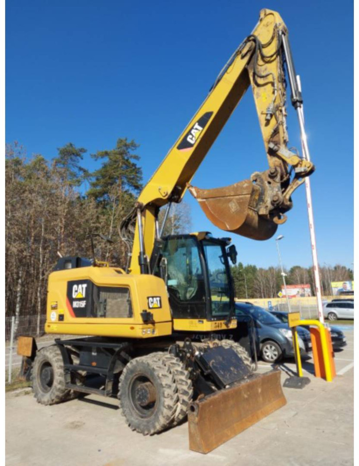 CAT M315F - Колёсный экскаватор: фото 2 CAT M315F - Колёсный экскаватор: фото 2