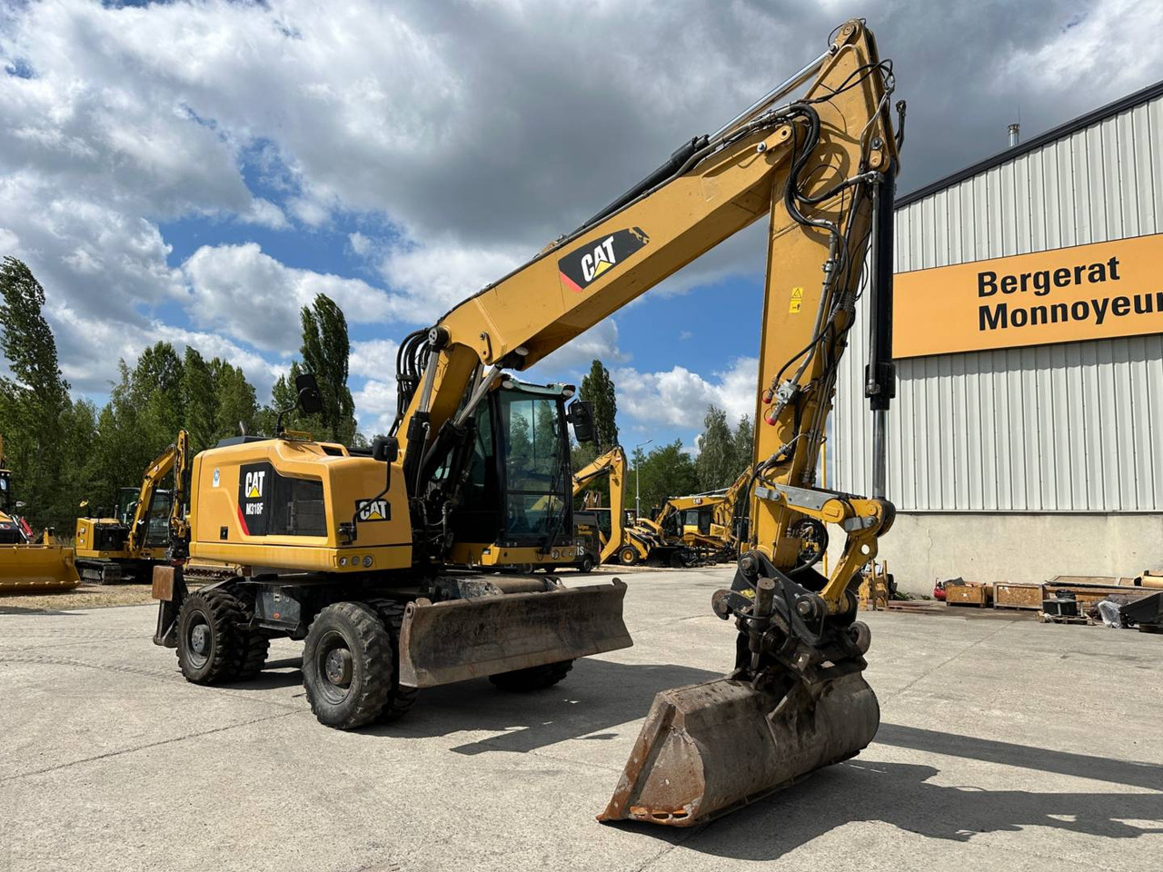 CAT M318F - Колёсный экскаватор: фото 2 CAT M318F - Колёсный экскаватор: фото 2