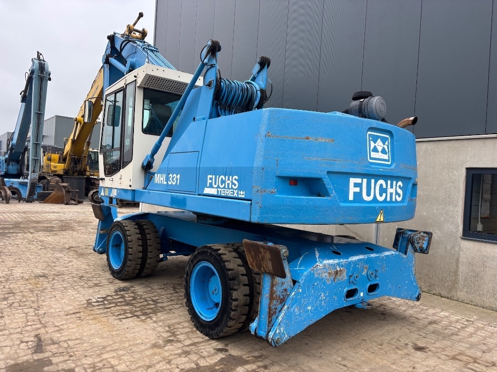 Fuchs MHL 331 C - MHL331 - MHL331C - Перегружатель: фото 5 Fuchs MHL 331 C - MHL331 - MHL331C - Перегружатель: фото 5