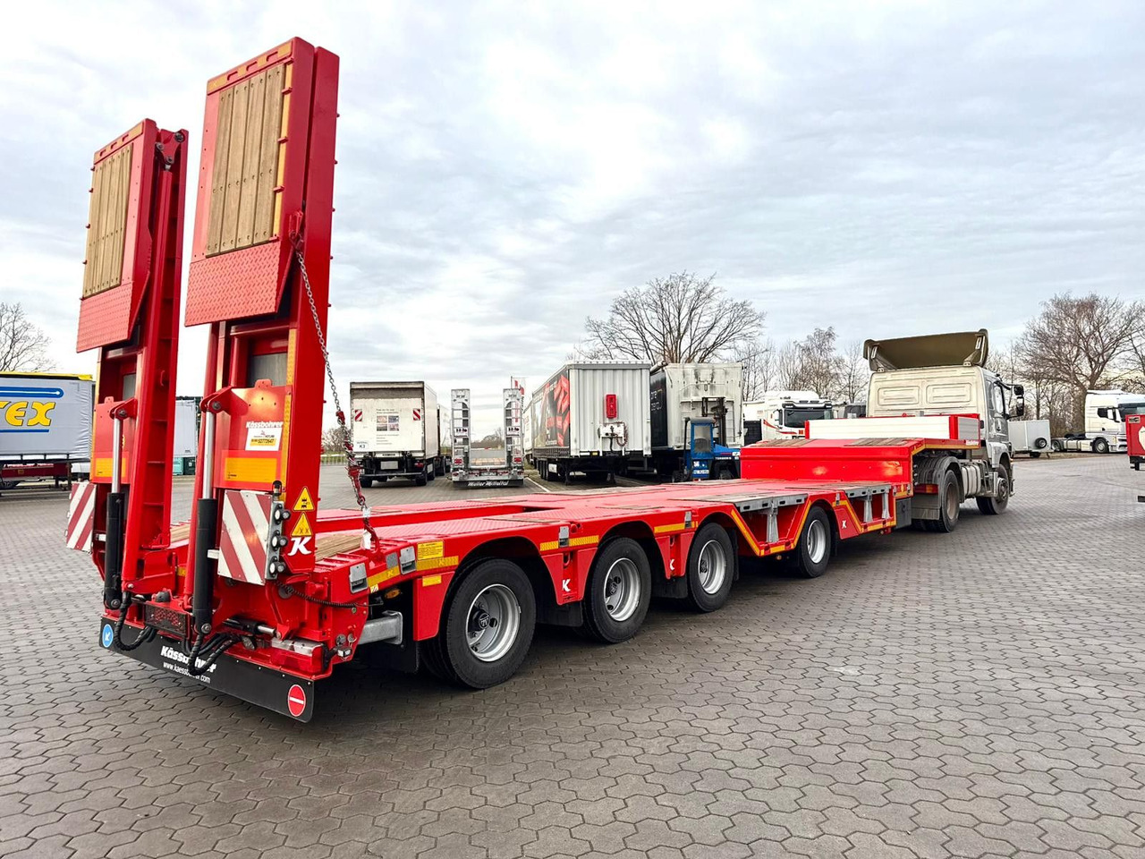 Kässbohrer K.SLA R 4 / 2N 18/40 Tieflader Radmulden tele - Низкорамный полуприцеп: фото 2 Kässbohrer K.SLA R 4 / 2N 18/40 Tieflader Radmulden tele - Низкорамный полуприцеп: фото 2