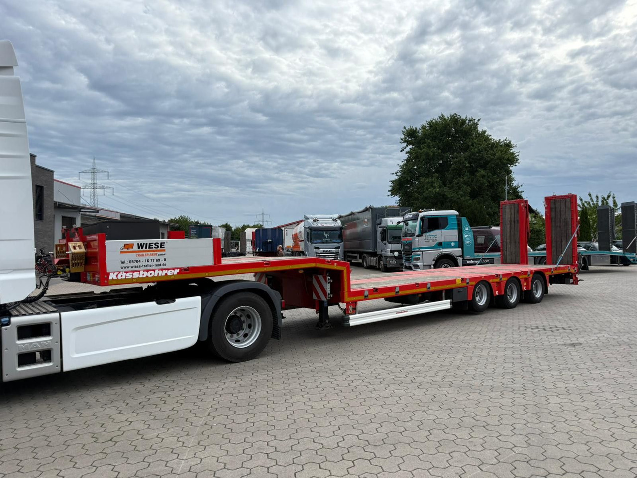 Kässbohrer K.SLS ECO Tieflader mit hydraulischen Rampen - Низкорамный полуприцеп: фото 4 Kässbohrer K.SLS ECO Tieflader mit hydraulischen Rampen - Низкорамный полуприцеп: фото 4