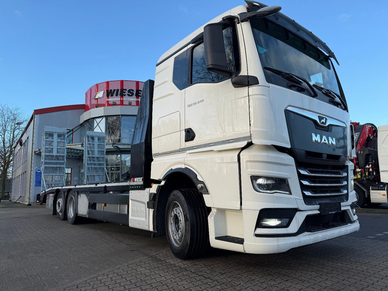 MAN Baumaschinen- Arbeitsbühnentransporter Rampen - Эвакуатор: фото 2 MAN Baumaschinen- Arbeitsbühnentransporter Rampen - Эвакуатор: фото 2