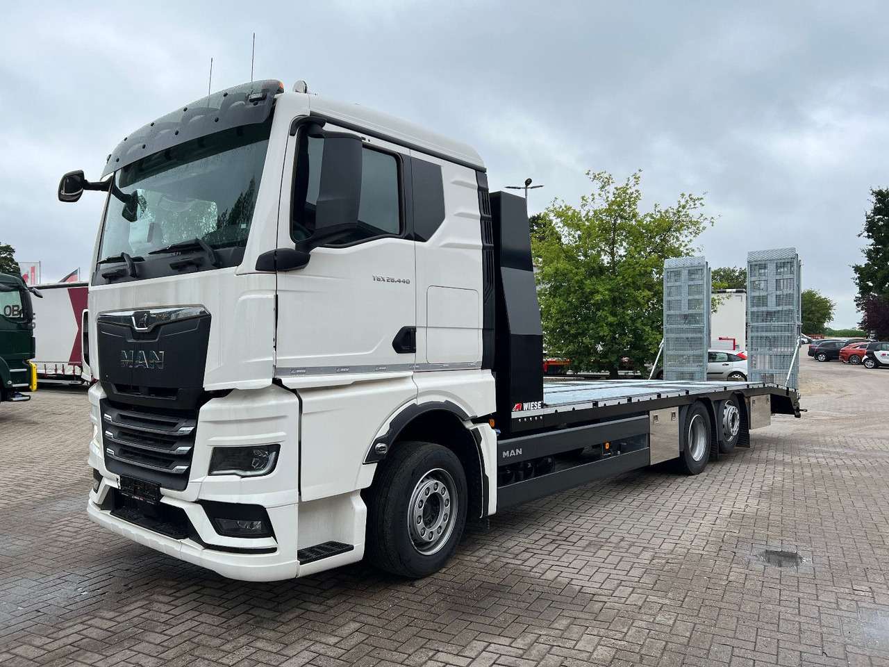 MAN Baumaschinen- Arbeitsbühnentransporter Rampen - Эвакуатор: фото 3 MAN Baumaschinen- Arbeitsbühnentransporter Rampen - Эвакуатор: фото 3