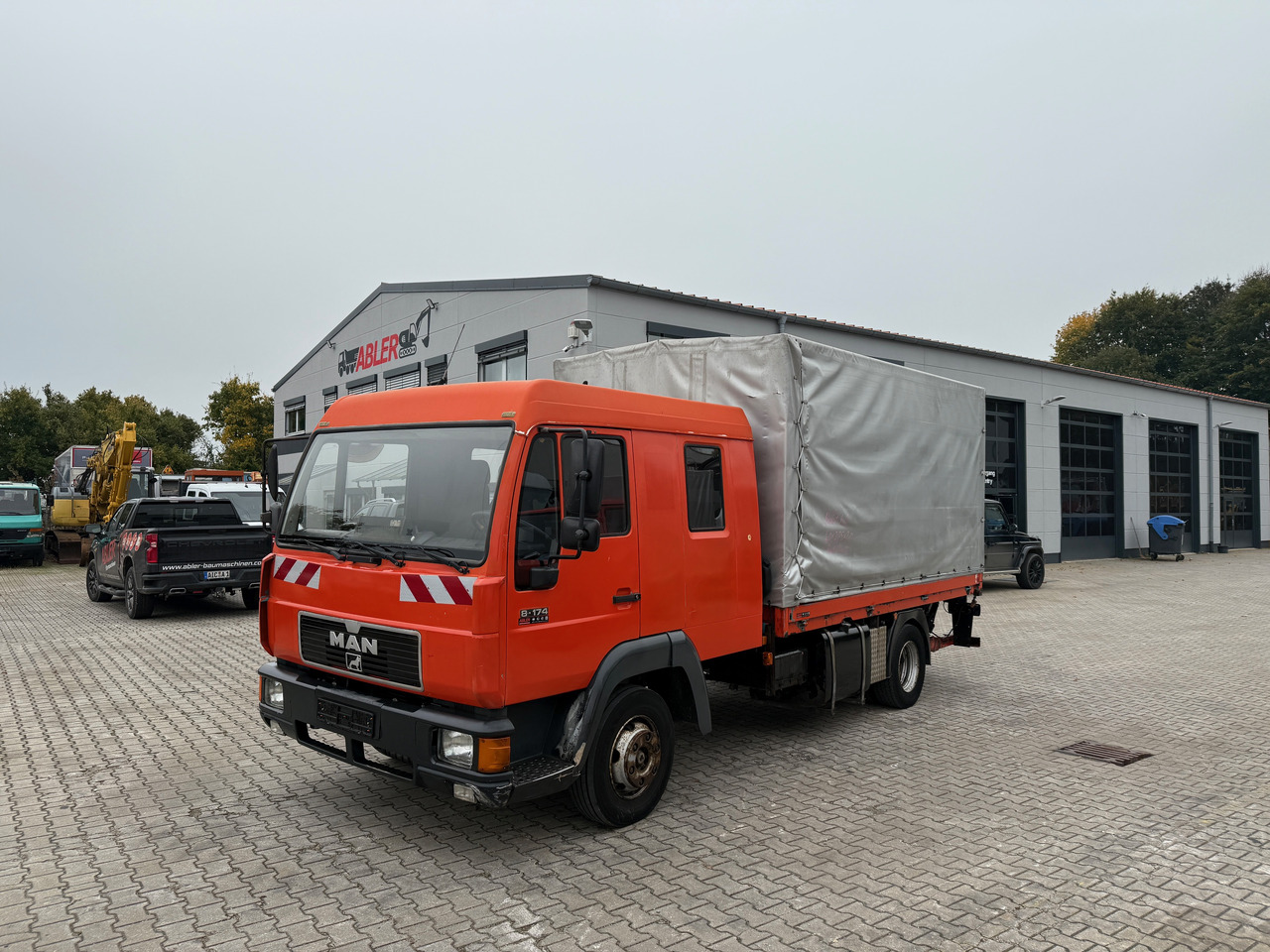 MAN 8.174 Pritsche+Plane+Ladebordwand DOKA L2000 - Тентованный грузовик: фото 2 MAN 8.174 Pritsche+Plane+Ladebordwand DOKA L2000 - Тентованный грузовик: фото 2