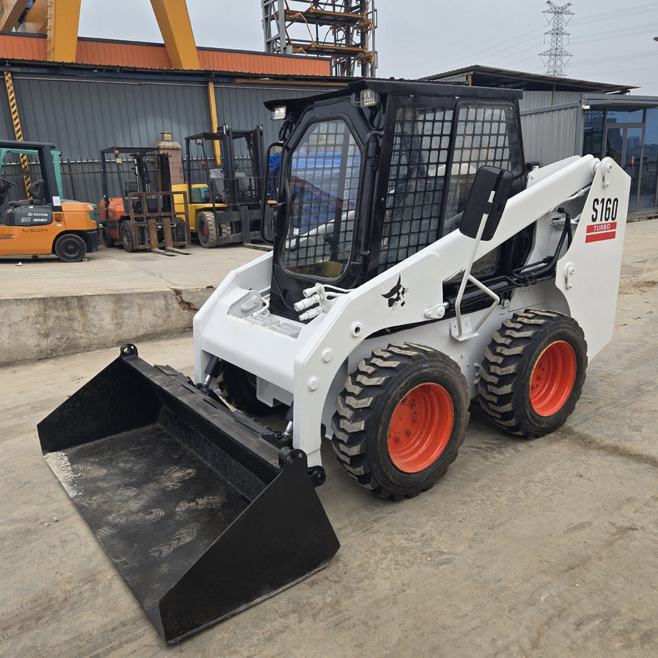 BOBCAT S160 - Мини-погрузчик с бортовым поворотом: фото 1 BOBCAT S160 - Мини-погрузчик с бортовым поворотом: фото 1