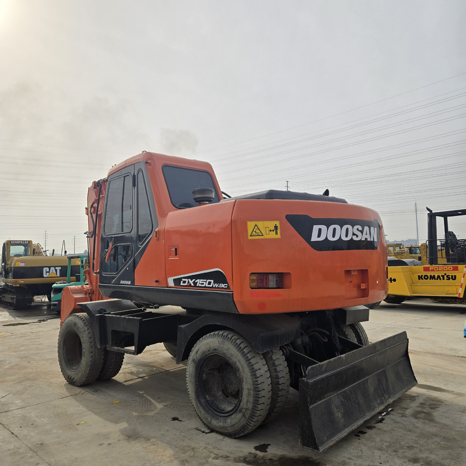 Колёсный экскаватор DOOSAN DX150W: фото 7