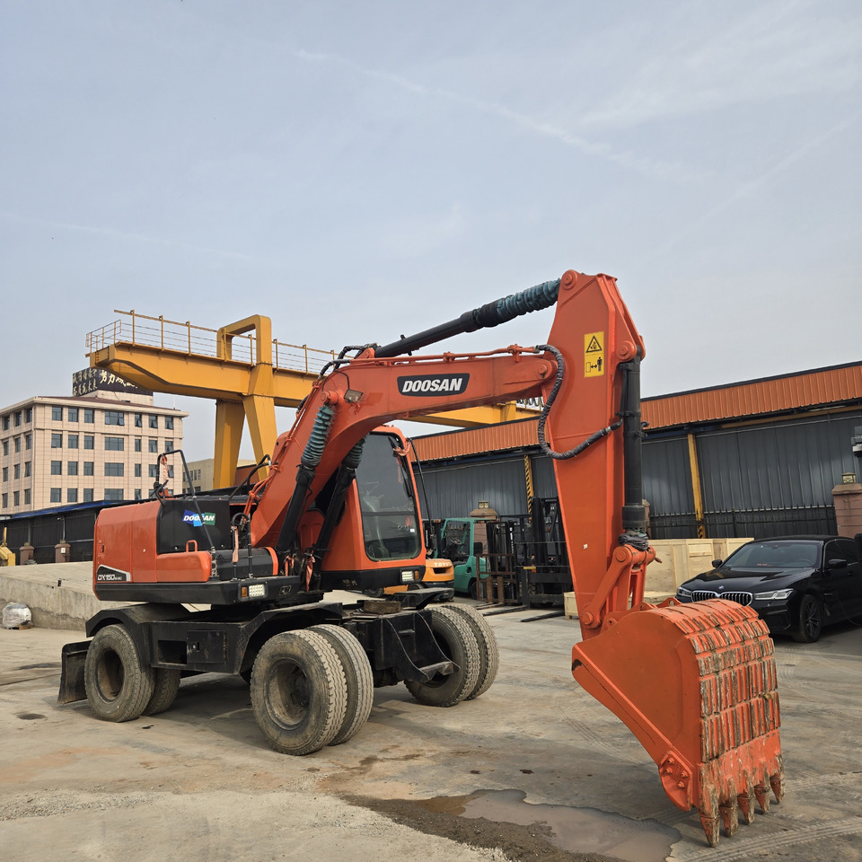 DOOSAN DX150W - Колёсный экскаватор: фото 1 DOOSAN DX150W - Колёсный экскаватор: фото 1