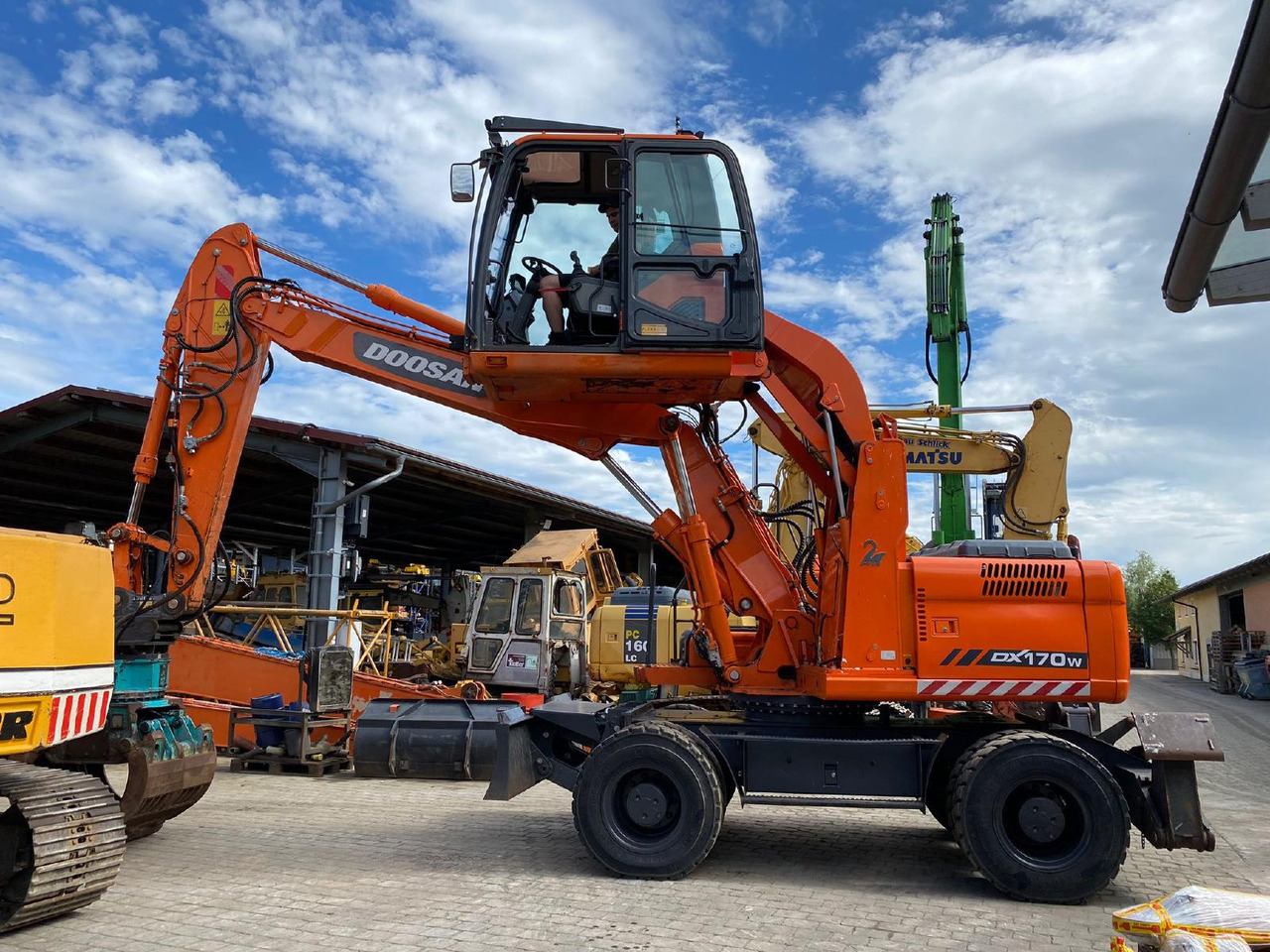 Doosan DX 170 W - Колёсный экскаватор: фото 1 Doosan DX 170 W - Колёсный экскаватор: фото 1
