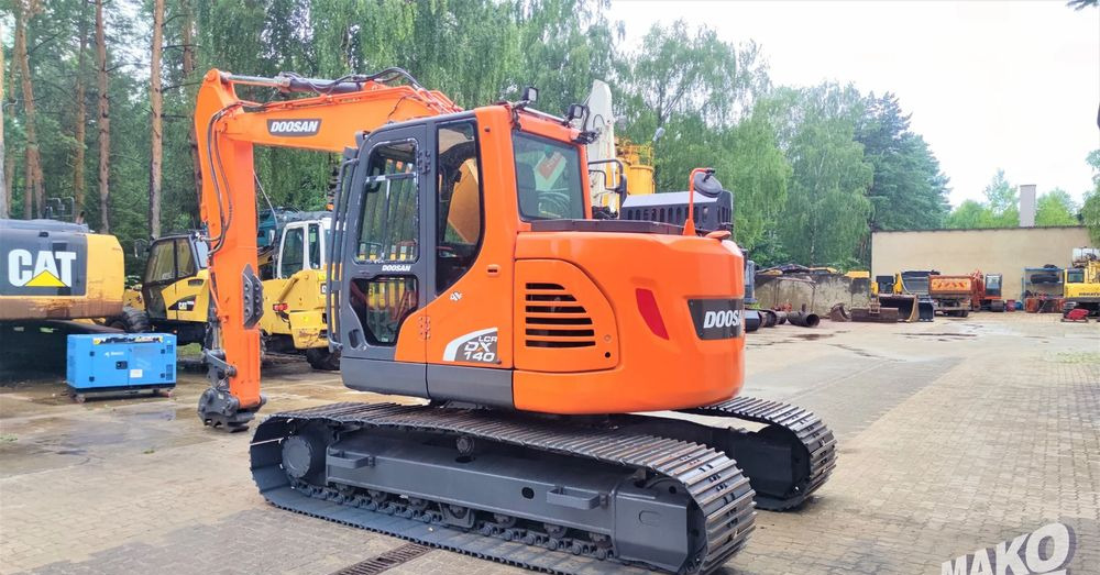 Doosan DX140LCR-5 - Гусеничный экскаватор: фото 2 Doosan DX140LCR-5 - Гусеничный экскаватор: фото 2