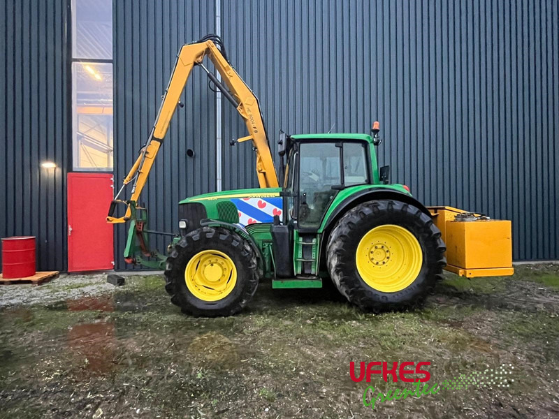 John Deere 6820 / BOS arm - Трактор: фото 1 John Deere 6820 / BOS arm - Трактор: фото 1