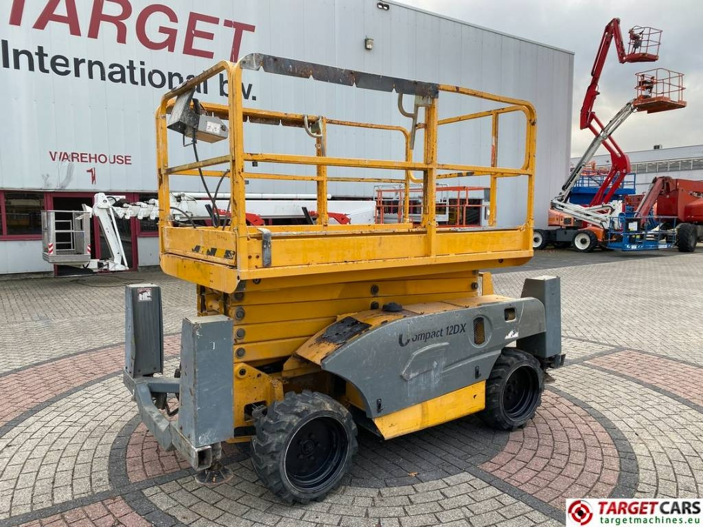 Haulotte Compact 12DX Diesel 4x4 Scissor Work Lift 1206cm - Ножничный подъемник: фото 1 Haulotte Compact 12DX Diesel 4x4 Scissor Work Lift 1206cm - Ножничный подъемник: фото 1